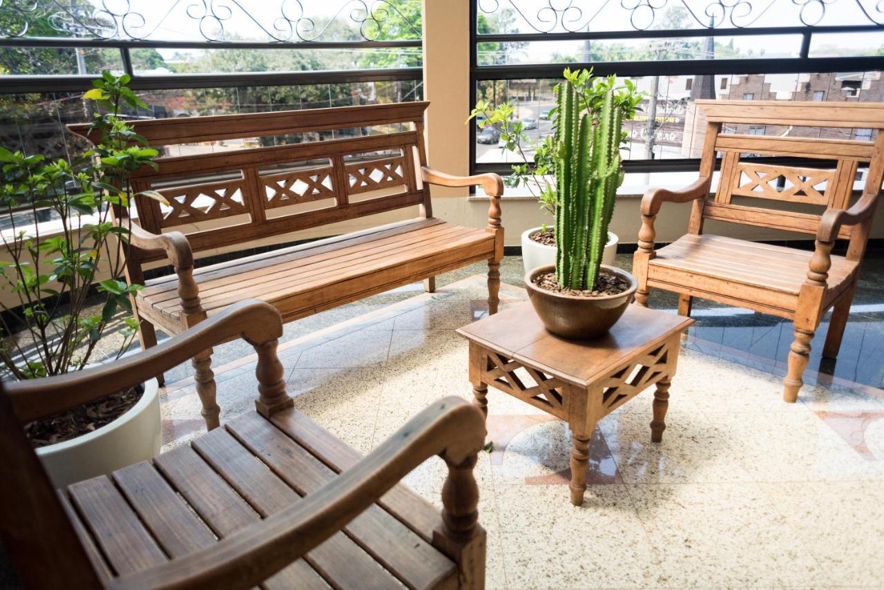 Holambra Garden Hotel Exterior foto A set of Thai style wooden furniture